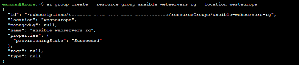 Screenshot of Azure Cloud Shell command prompt window with Azure CLI commands for creating an Azure resource group successfully completed
