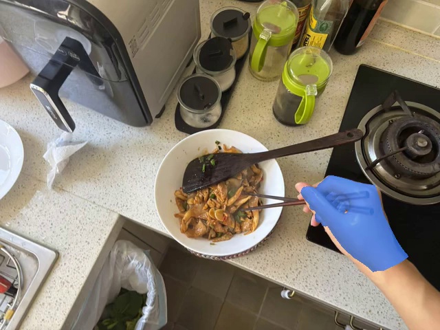 Mix the food in the bowl with chopsticks