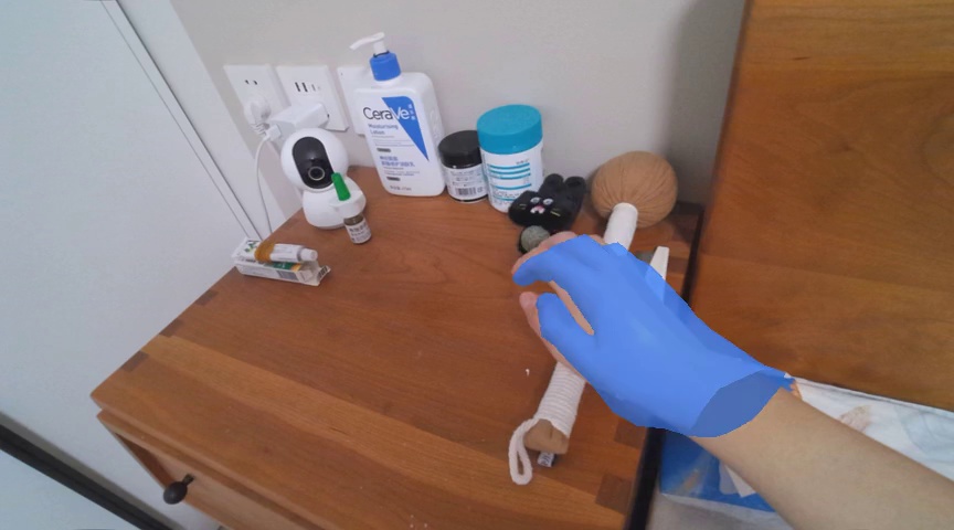 Pick up the white round  bottle with blue cap