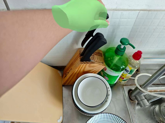 Place the knife into the wooden knife holder