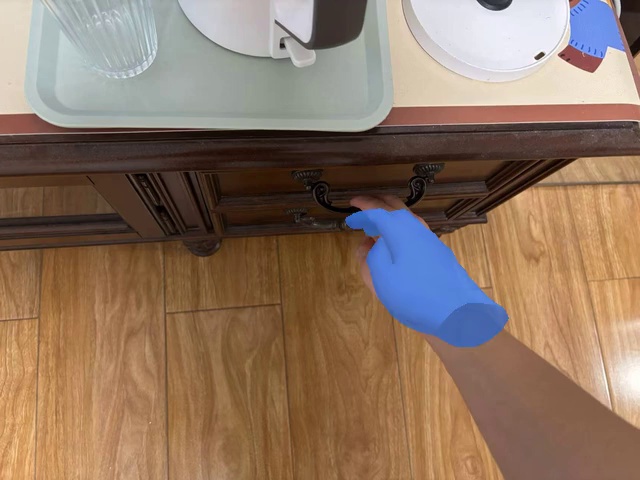 Pull out the drawer by its handle