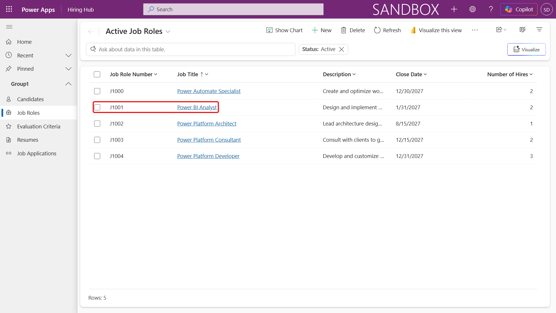 The J1001 sample row in the Job Roles list
