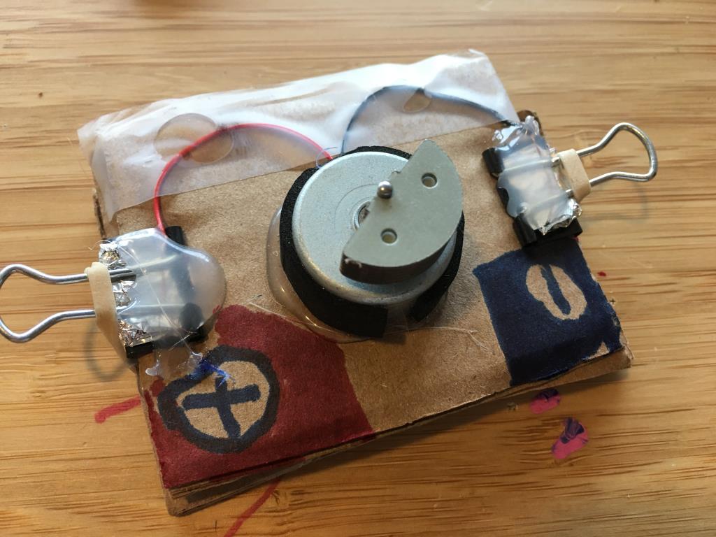 A vibrating DC motor harvested from a game controller