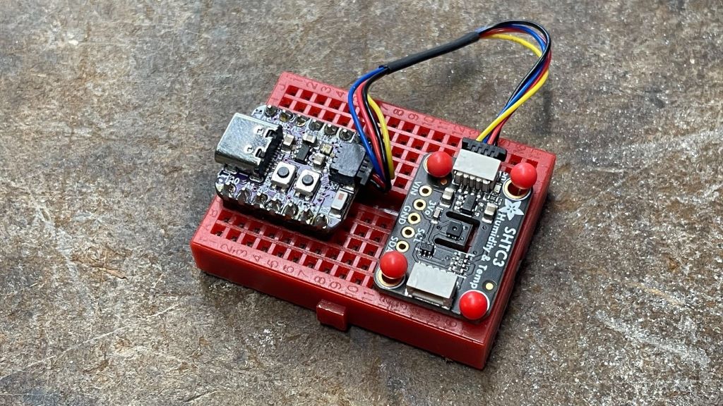 A photograph of the Adafruit QT Py and SHTC3 breakout