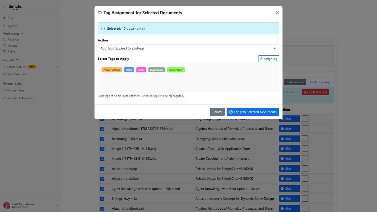 The Tag Assignment dialog for ten selected documents, showing the action selector set to Add Tags, the available tag chips to apply, and the Apply to Selected Documents button.