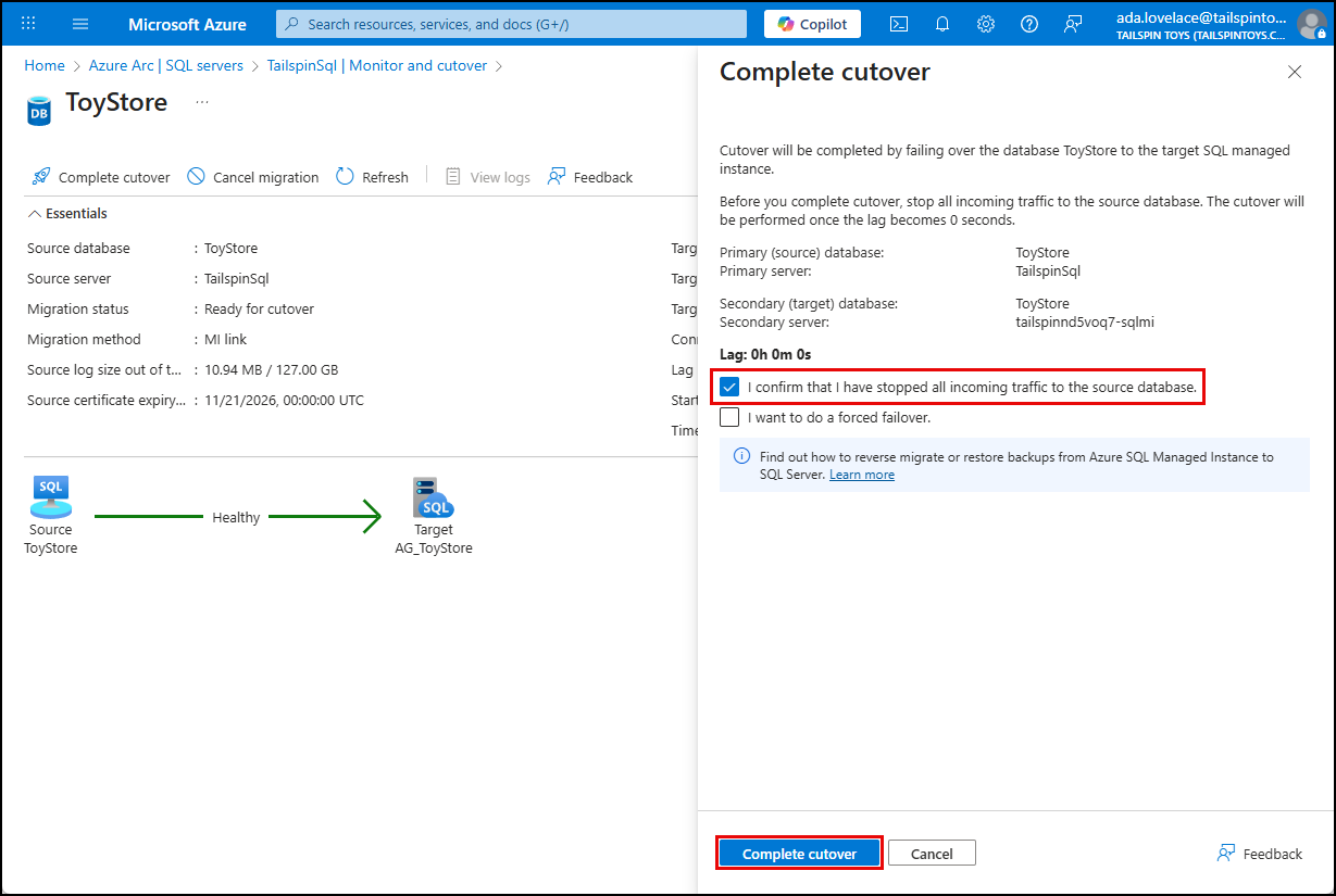 The I confirm that I have stopped all incoming traffic to the source database box is check and highlighted and the Complete cutover button is highlighted.