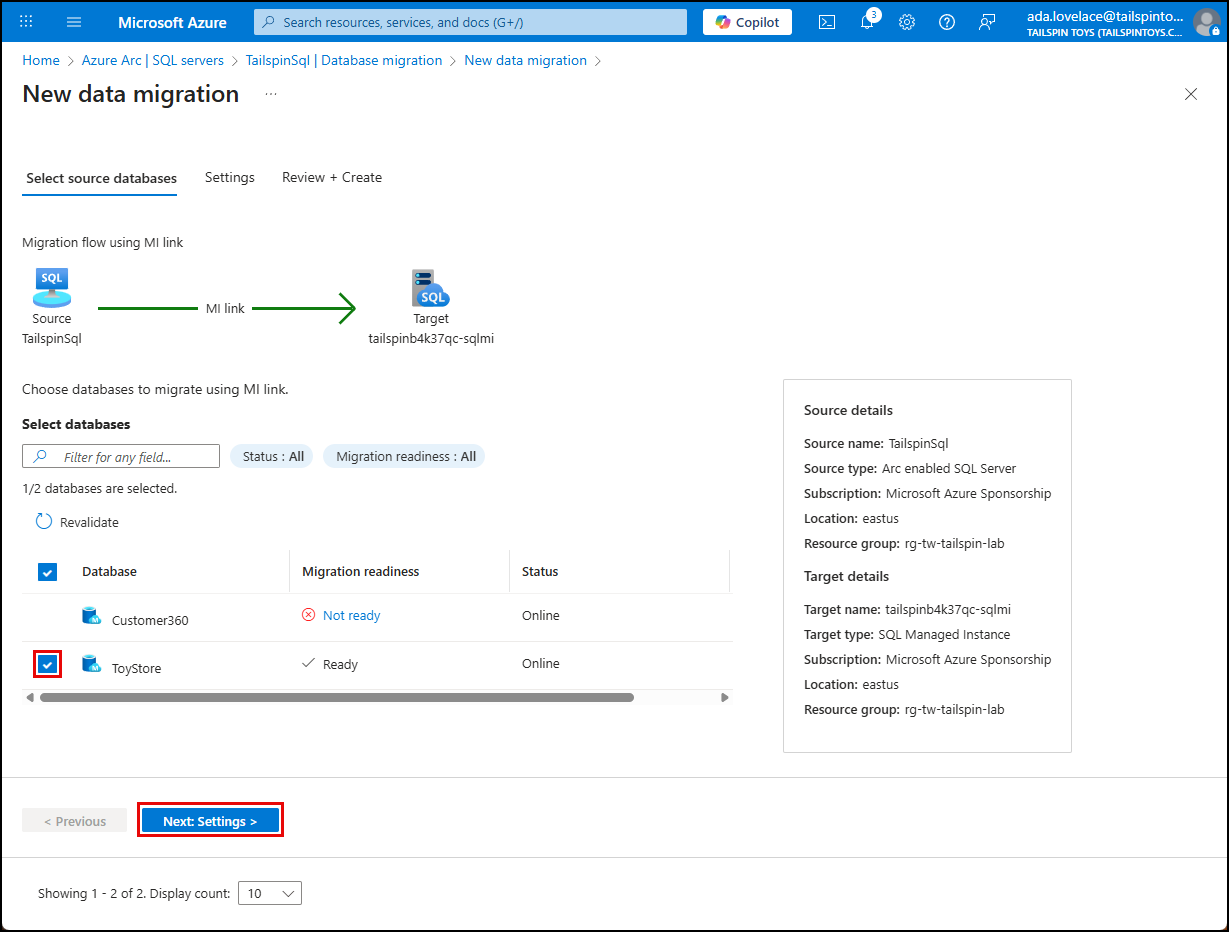 On the Select source databases tab of the new data migration blade, ToyStore is checked and the Next button is highlighted.