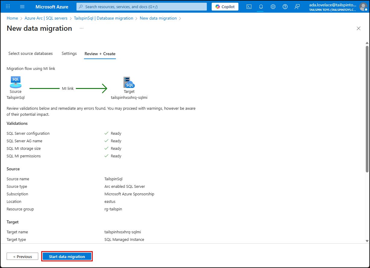 The Start data migration button is highlighted on the review + create tab.